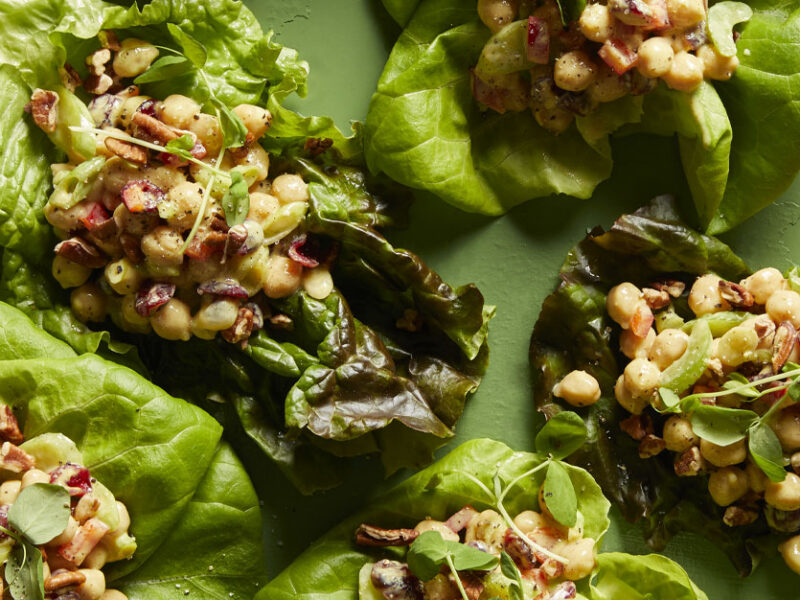 Curry Chickpea Lettuce Wraps on a green background