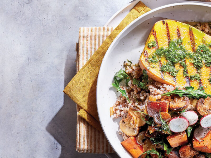 Butternut Squash Steak Supper in a white bowl against a white marble background