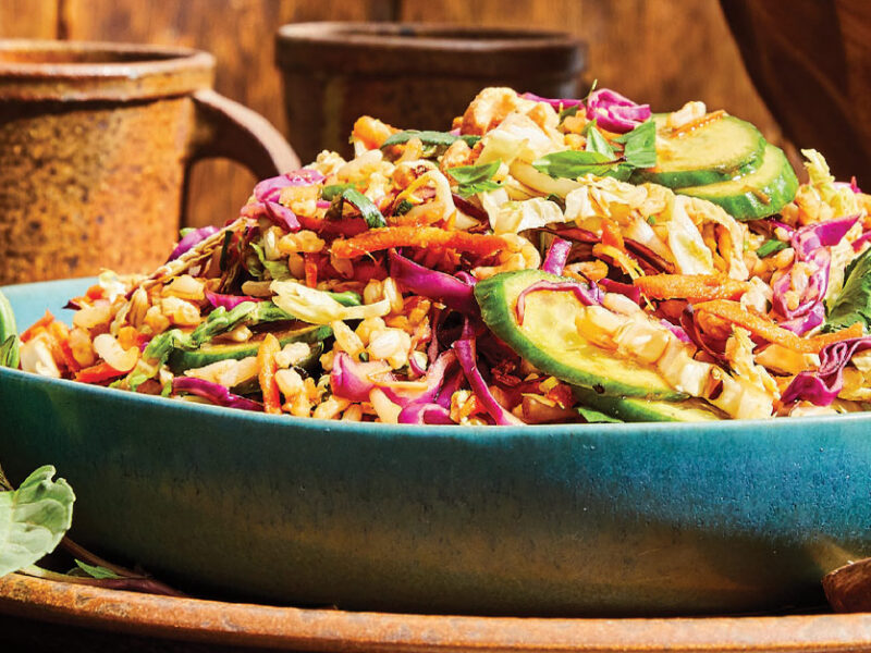 Thai Breakfast Salad in a teal ceramic serving bowl