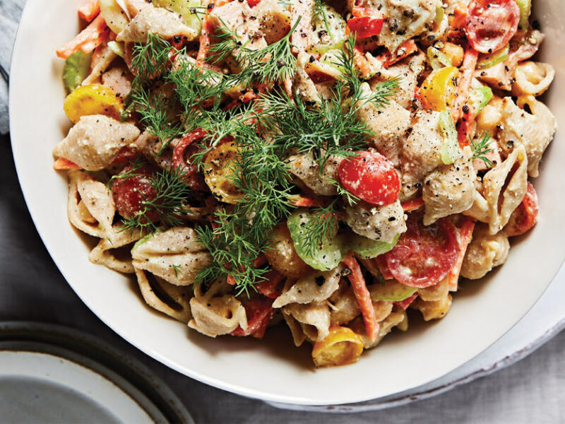 Veggie Potluck Pasta Salad in a white ceramic dish