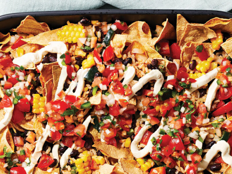 Healthy Breakfast Nachos with Vegan Sour Cream in a cast iron casserole dish