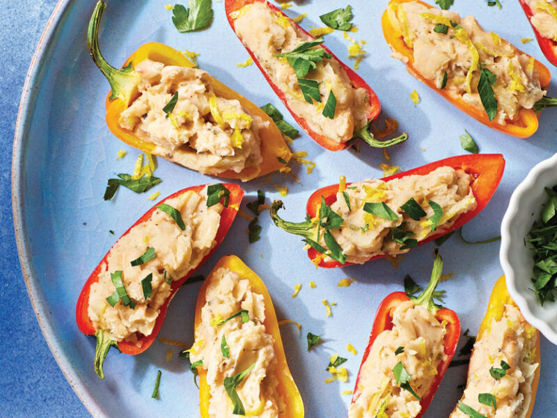 Greek Stuffed Mini Peppers on a light blue ceramic plate