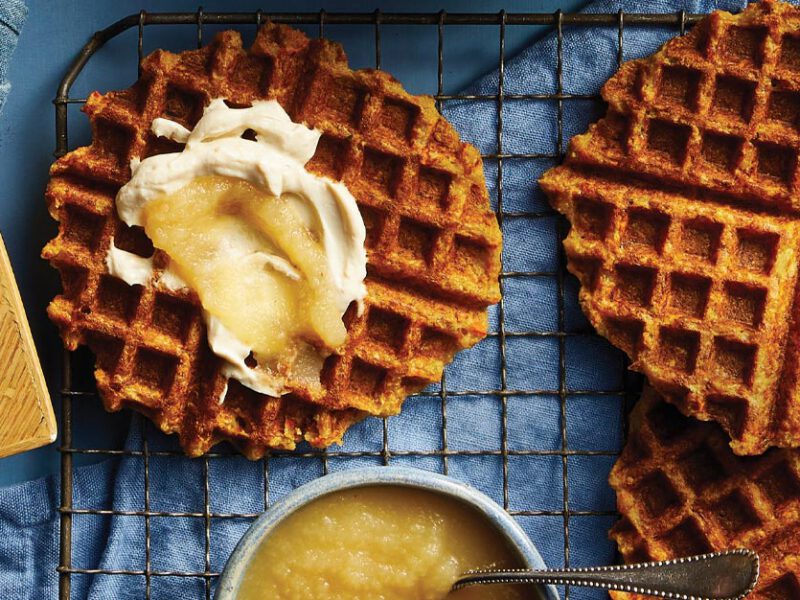 Crunchy Hash Brown Waffles with Applesauce on a black metal cooling rack