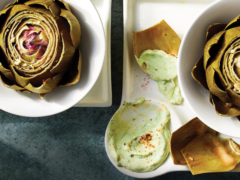 Instant Pot Artichokes with Lemony Vegan Aioli in white ceramic bowls