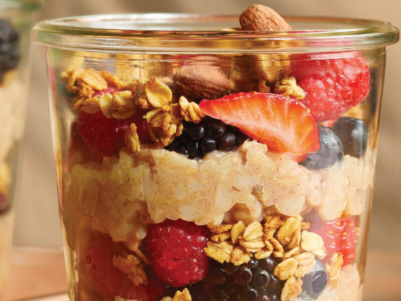 Close-up of three Granola Parfaits with Berries and Brown Rice Pudding