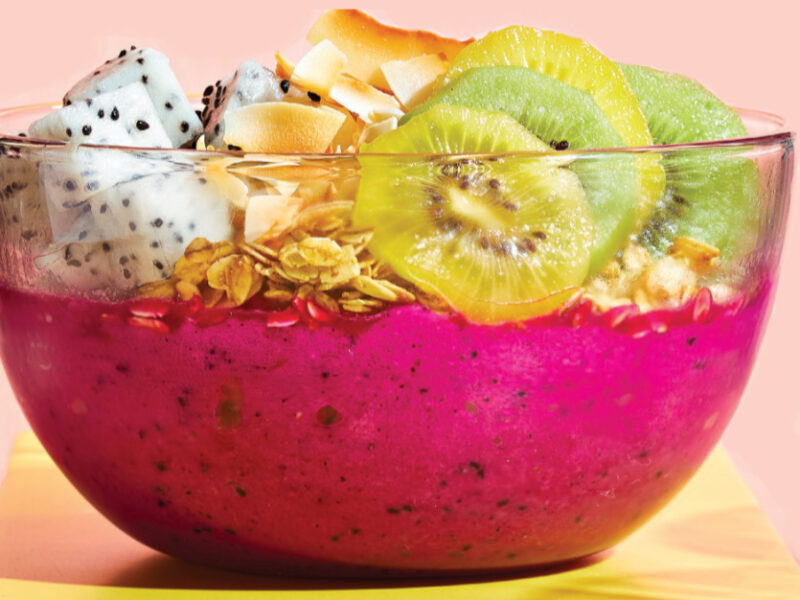 5-Minute Dragon Fruit Smoothie Bowl on a bright yellow plate against a pale pink background