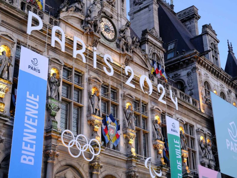 A close-up of the facade of the Parisian city hall with the Olympic games logo. Paris, France - March 22, 2024.
