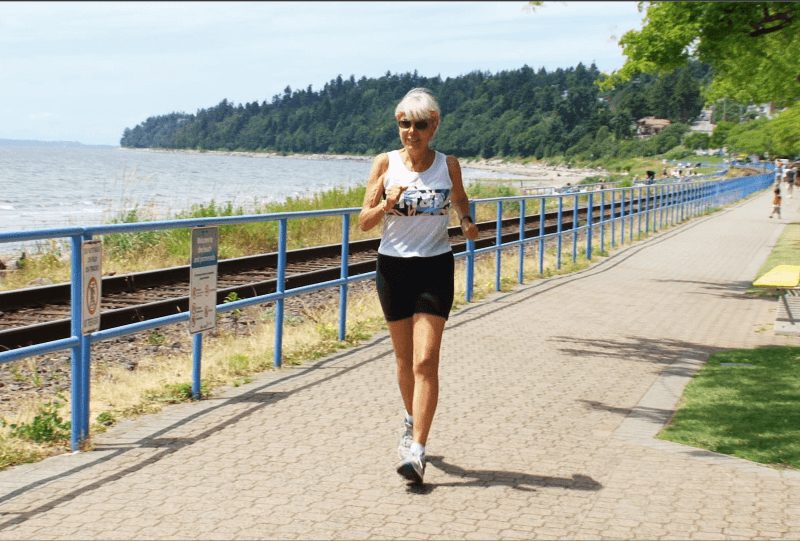 Ruth Heidrich joggin along a water front