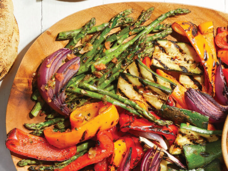 Grilled Fajita Platter on a large wooden platter with a bowl of Smoky Tomato Salsa