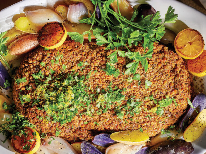 Millet-Lentil Vegan Thanksgivng Roast with Fingerling Potatoes on a platter