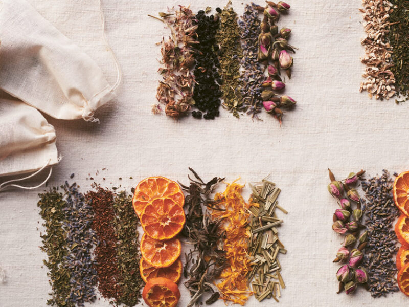 dried flowers herbs and other plant ingredients shown grouped together to create four tea blends by Pamela Anderson
