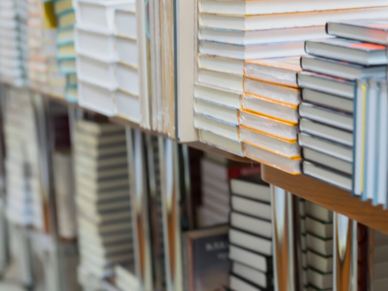 stacks of books at a bookshop