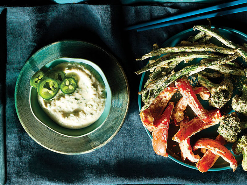 Air-Fried Tempura Veggies on a plate next to a small bowl of Jalapeño-Lime Sauce