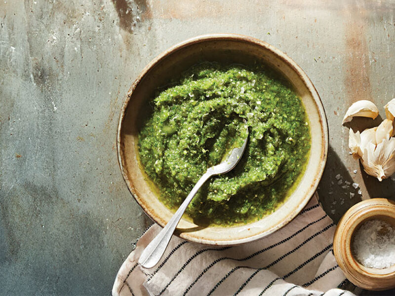 a small bowl of Roasted Poblano Salsa Verde with a teaspoon in the side