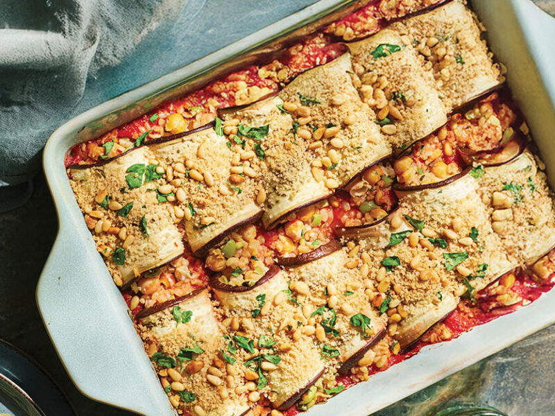 Risotto-Filled Eggplant Rollatini in a white casserole dish