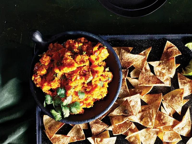Chipotle Sweet Potato Dip on a platter with baked tortilla chips