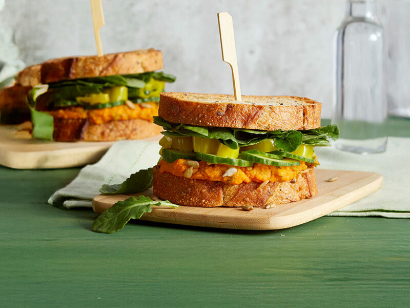 Greens and Things Sandwiches on a green tablecloth
