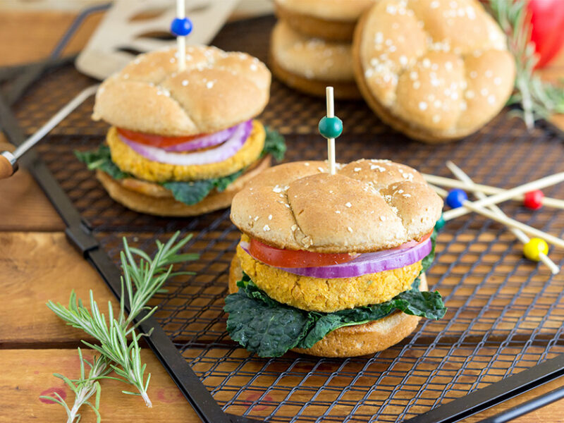 Chickpea Burgers on a wooden chopping board