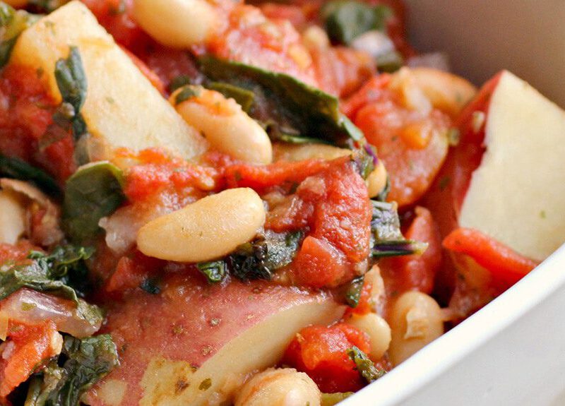 Italian White Bean, Kale and Potato Stew in a white bowl