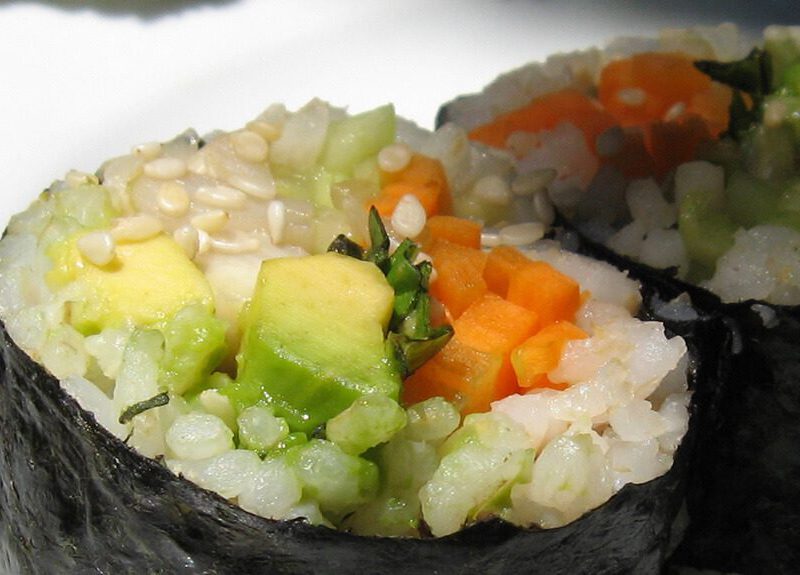 Closeup of two pieces of vegan sushi