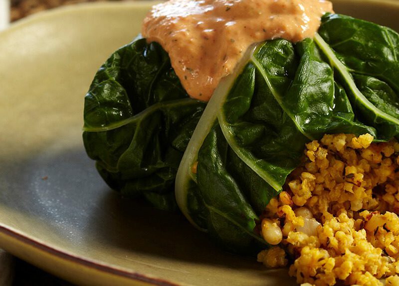 A Millet-Stuffed Chard Roll with Roasted Red Pepper Sauce