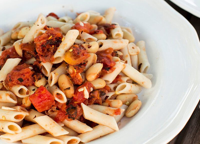 This bean pasta recipe is so easy to put together. I serve this with sautéed kale. I like this dish with a lot of garlic, but adjust it as you wish.