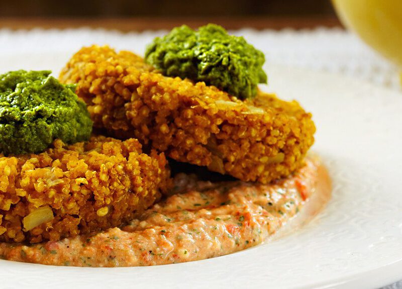 Curried Millet Cakes with Creamy Red Pepper Coriander Sauce