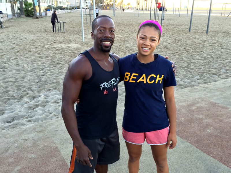 Keera-Kappel-Clark and her father at Venice beach wearing exercise clothing