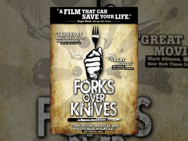 Forks Over Knives movie poster with an image of a fist holding a fork