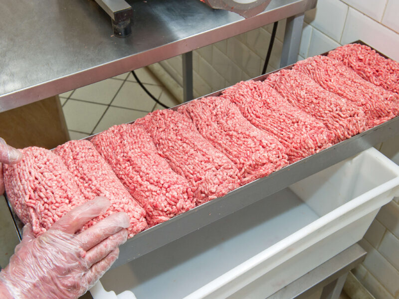 A large tray of raw ground beef