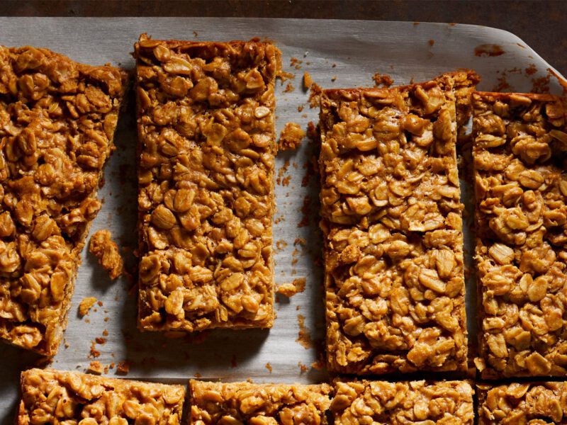 Peanut Butter Granola Bars on parchment paper on a baking tray