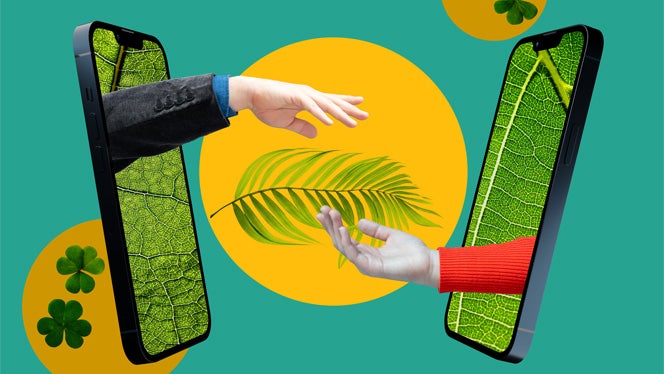 Two phones with hands reaching out of them on a green background with leaves