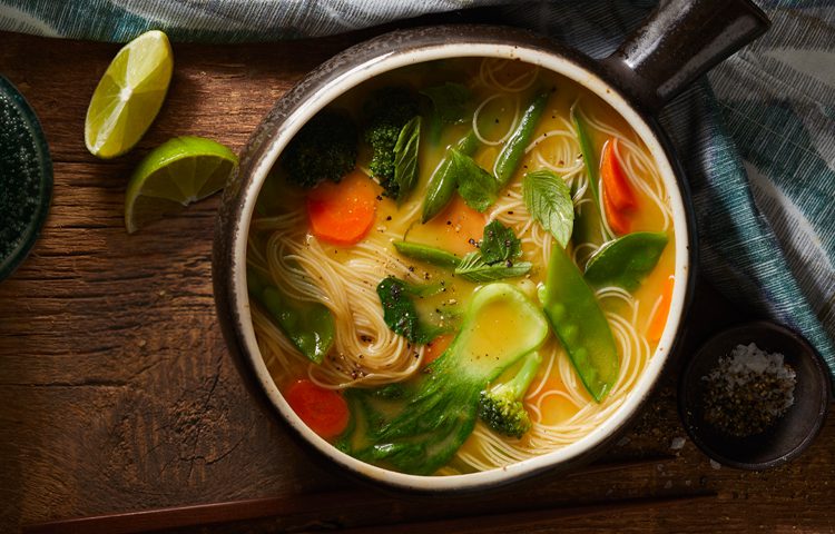 Thai Spring Noodle Soup shown from above in a pot
